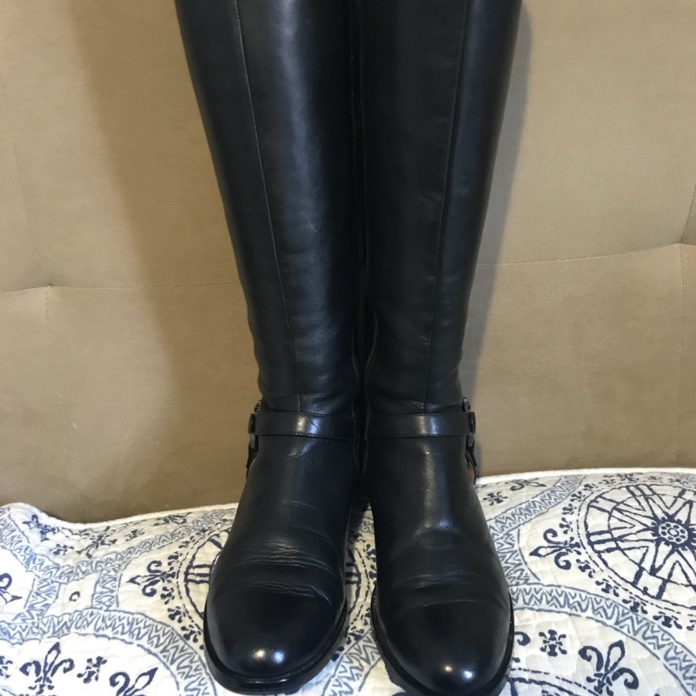 Leather riding boots.